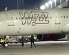 Așa ceva nu s-a mai văzut: Doi pasageri români au alergat după un avion Wizz Air, la Koln