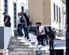 Cătușe, veste antiglonț și escortă armată: apariție spectaculoasă a lui Plahotniuc în instanța din Grecia