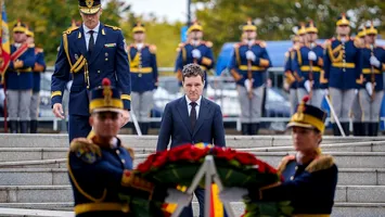 Ceremonie cu scandal: Nicușor Dan, acuzat că blochează legea antisemitismului