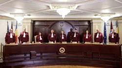 Scrisoarea lui Bolojan către CCR: momentul în care statul român se privește în oglindă și vede factura privilegiilor