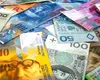 Investitorii fug de risc: Yenul și francul elvețian devin vedetele crizei comerciale