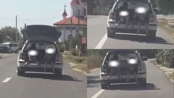 Doi copii, transportați în portbagajul deschis al unei mașini din Gorj. Cât l-a costat pe șofer „plimbarea” celor mici