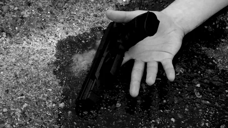 EXCLUSIV. Un polițist din Giurgiu s-a sinucis cu arma din dotare din gelozie pe Bădălău