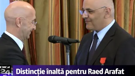 Cine l-a decorat pe Raed Arafat