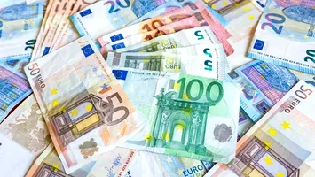 Moneda națională s-a depreciat, față de euro, la cursul oficial al BNR