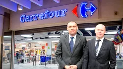 O firmă unde patronul Superbet e acționar cere insolvența retailerului Carrefour vizat de frații Pavăl