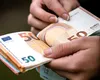 Poliţist de frontieră, reţinut după ce a pus în circulație bani falși