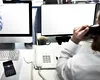 Grupare infracțională care activa în șase call center-uri, destructurată de DIICOT