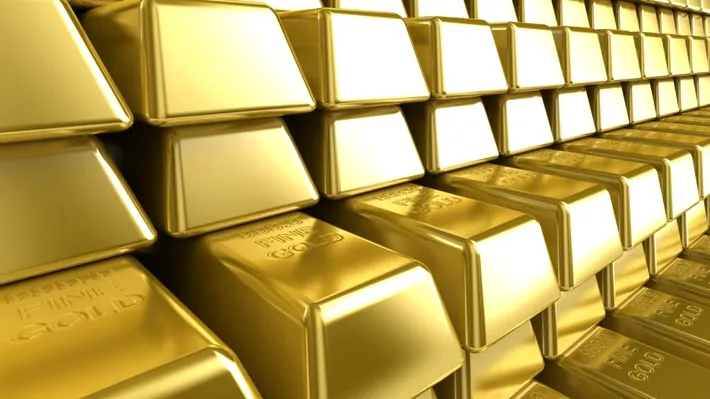 Maxim istoric de preț, pe uncia de aur. Metalul galben s-a vândut cu 2.427 dolari, în luna mai