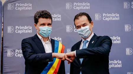 Premierul Orban, primarul și prefectul Capitalei, vizită de mulțumire la call centerul Covid 19