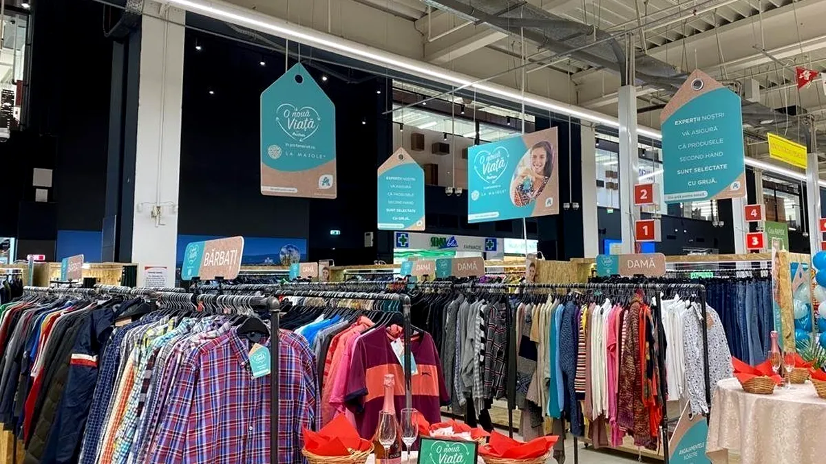 Premieră: Auchan va începe comercializarea hainelor second hand