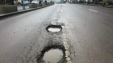 Mașina stricată de gropile din București? Cine plătește reparațiile