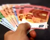 Cursul valutar: 1 euro este cotat de BNR la 4,9775 lei. Analiştii estimează că un nou război valutar se profilează la orizont