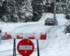 „Distracție” de Crăciun pe Transfăgărășan: cu mașina pe drum închis