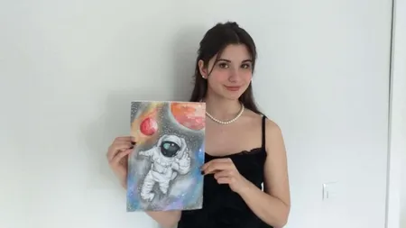 Pictura unei românce va fi imprimată pe costumul unui astronaut