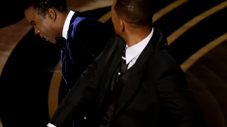 Incident la Oscar: Will Smith l-a pălmuit pe actorul Chris Rock din cauza unei glume despre soția sa (video)