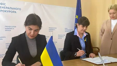 În plin război, Kovesi a mers în Ucraina să semneze un protocol