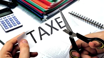 Sistemul fiscal din România, o povară. Un economist susține că românul dă către stat 70% din venituri