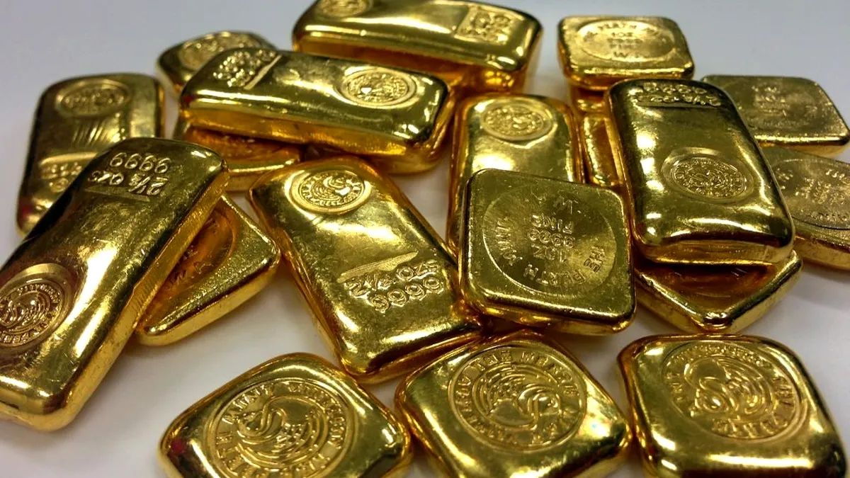 Lingourile de 100 de grame și monedele de o uncie, cele mai căutate produse din aur achiziționate de români
