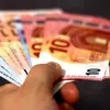 Euro a sărit la 5,35 lei pe interbancar cu o zi înainte de decizia S&P. Rezerva valutară a BNR a scăzut cu 4,8 mld. euro într-o lună