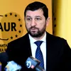 Conflictul dintre fondatorii AUR escaladează: Lulea reclamă al doilea cap de porc, Simion vorbește despre un atac