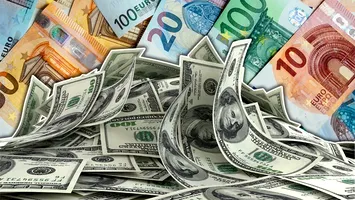 Moneda națională s-a depreciat, joi, în cotațiile BNR, până la 4,9766 lei