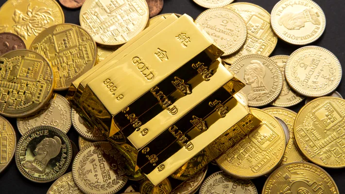 Aurul şi argintul, în picaj după valori record. Ce rol joacă Rezerva Federală