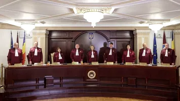 Scrisoarea lui Bolojan către CCR: momentul în care statul român se privește în oglindă și vede factura privilegiilor