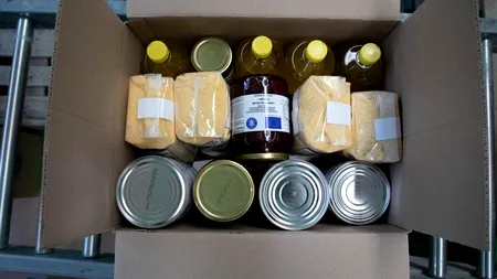 Pachete cu alimente de sărbători. Cine sunt românii care primesc ajutoare