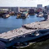 SUA își consolidează prezența navală lângă Iran cu al treilea portavion