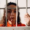 O femeie îi trimitea soțului la pușcărie droguri impregnate în hârtie. Aceasta a fost arestată.
