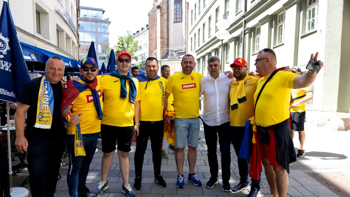 Marcel Ciolacu a făcut furori printre suporterii tricolorilor, la Munchen. Imagini inedite cu premierul: “M-am bucurat să cânt!”