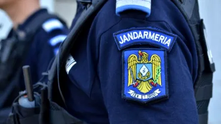 Jandarmi răniți de același glonț după ce arma unuia dintre ei s-a descărcat