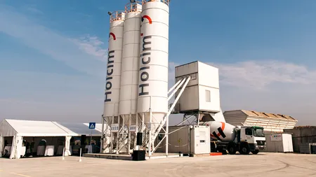 Holcim se uită după noi achiziții de fabrici pentru a-și diversifica gama de produse
