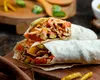Shaorma cu de toate pe litoral! Bacterii fecaloide și Salmonella descoperite în preparat