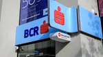 BCR: profit în scădere cu 18%, nu pentru că merge rău banca, ci pentru că se pregătește de vremuri grele. Ce spune bilanțul semestrial despre economia României
