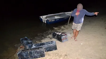 Un fost polițist de frontieră, prins pe malul Prutului cu mii de pachete de țigări de contrabandă