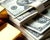 Leul câştigă aproape 2 bani în raport cu dolarul american, la cursul oficial. Aurul, la cel mai mic nivel din ultima lună