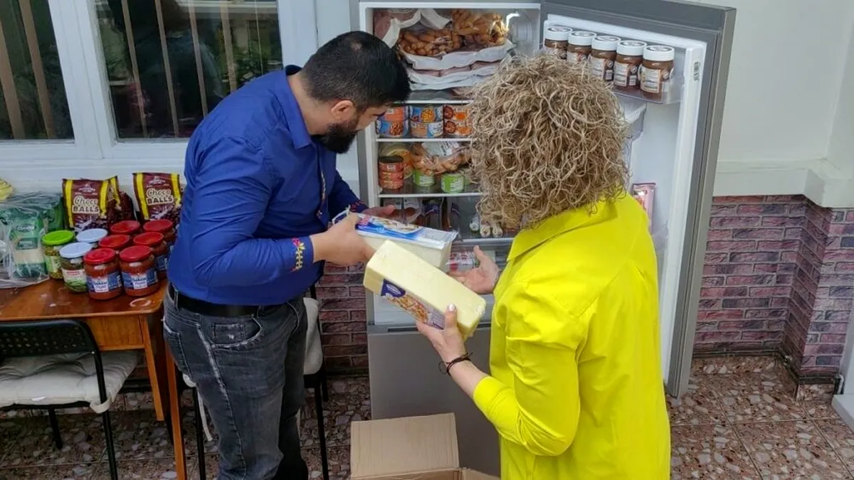 Românii pot mânca gratis de la frigiderul comunitar. Cine se poate înscrie pe listă
