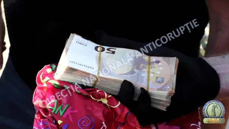 Flagrant DNA în plin scandal politic: un bărbat ar fi cerut 40.000 de euro de la un primar și bani pentru „intervenții” în alte dosare