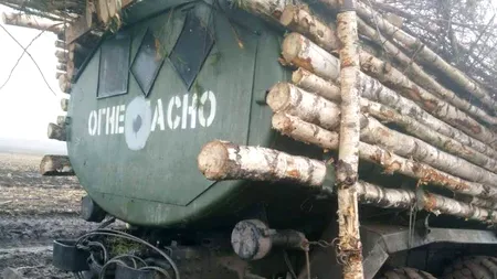 Armata rusă își deghizează camioanele cu combustibil în camioane de transport lemne (galerie foto)