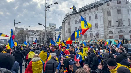 La mitingul AUR, în uniformă, cu briceagul și echipament complet de luptă