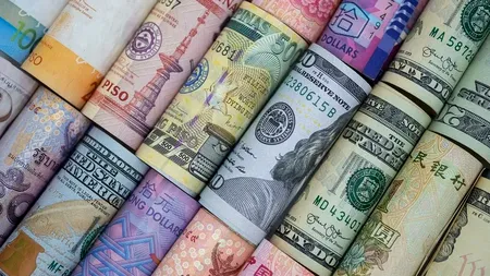 Leul s-a depreciat, luni, față de toate valutele principale. Prețul aurului a crescut