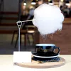 Cafeaua care se servește sub un norișor de zahăr