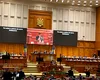 George Simion, gest fără precedent în Parlament: un minut de tăcere la tribuna moțiunii de cenzură