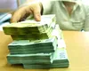 Românii pun bani deoparte în ciuda crizei. Depozitele în lei au luat avânt