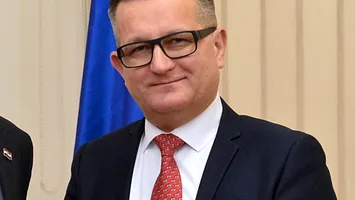 Florin Lazăr Vlădică, numit director al Oficiului Informații Integrate de Bolojan, apropiatul unor personaje controversate din România
