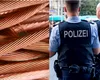 Poliția germană a arestat șase români care au furat 80 km de cablu de cupru