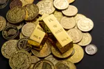 Aurul doboară record după record. Ce rol joacă China