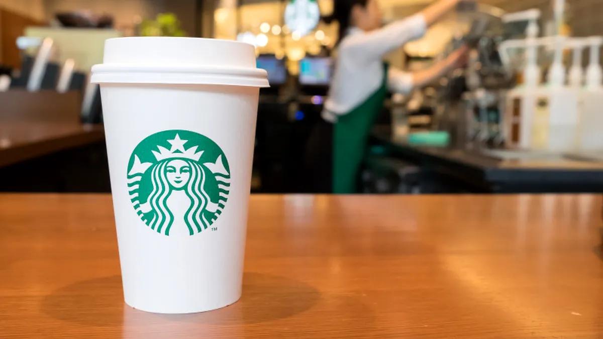 De ce compania Starbucks e obligată să plătească 50 de milioane de dolari unui client